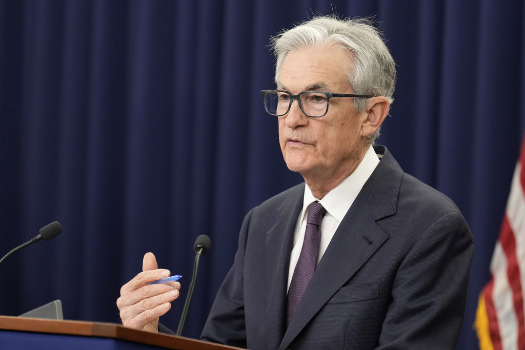 Federal Reserve leaves its key rate unchanged but sees two cuts this year
