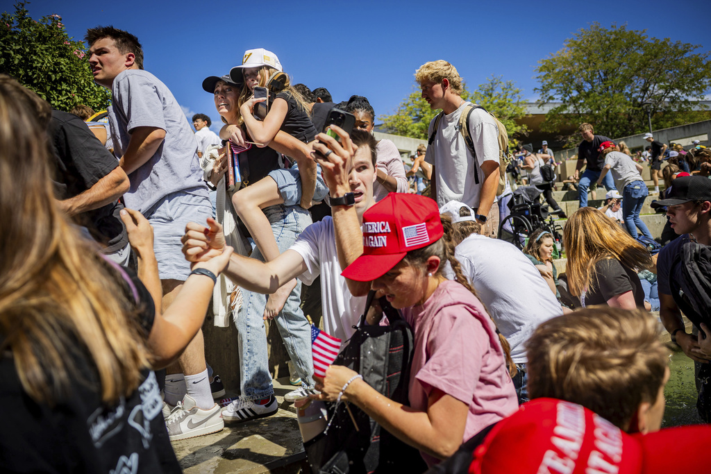 Authorities search for conservative activist Charlie Kirk’s killer but provide little about motive