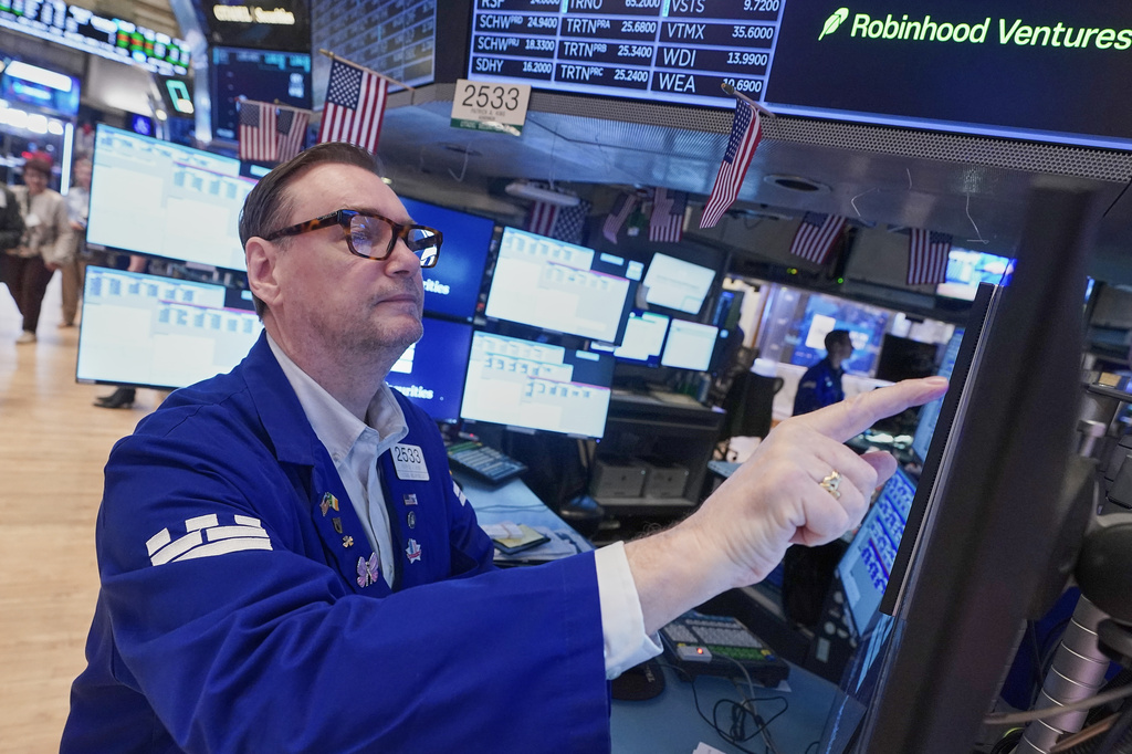 Wall Street flirts with records after oil prices give back some of Monday’s spurt